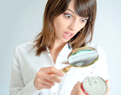 Woman-with-magnifier-aghast-crop